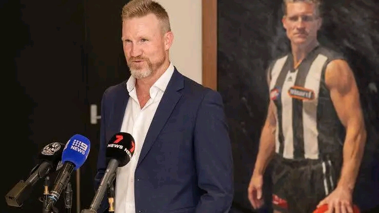 I Am Coming Back to Revive the Team and See Us – Collingwood Win Again, Says Former Head Coach Nathan Buckley as He Returns to Collingwood as Strategic Advisor In a stunning twist that has electrified the AFL community, **former Collingwood head coach Nathan Buckley** has officially returned to the club he once led with unwavering passion — not as a coach, but in a strategic advisory role** aimed at reinvigorating the struggling Magpies. Buckley, who stepped down as head coach in 2021 after nearly a decade at the helm, announced his return in an emotionally charged press conference at the AIA Centre on Sunday morning. His message was clear: “I am coming back to revive the team and see us Collingwood win again. The news follows a turbulent stretch for the Magpies, who, despite winning the 2023 premiership under Craig McRae, have seen a significant slump in form this season. Injuries, inconsistency, and mounting pressure have led to calls for experienced leadership behind the scenes — and few figures loom larger in the club’s modern history than Buckley. A Magpie Legend Returns Nathan Buckley’s connection to Collingwood is deep and enduring. A former Brownlow Medalist and one of the game’s most respected figures, Buckley played 260 games for the club and served as captain from 1999 to 2007 before transitioning into coaching. His 10-year coaching tenure included multiple finals appearances and a narrow Grand Final loss in 2018. Now, Buckley returns not to take over the top job, but to provide **strategic guidance and cultural leadership working closely with McRae and the football department. This isn’t about ego or reclaiming the past,” Buckley said. “It’s about helping where I can. I love this club — I’ve lived and breathed black and white. And I couldn’t just sit back and watch us lose our way without offering something. Club president Jeff Browne welcomed the move, describing it as a “reunion of purpose. Nathan’s experience, knowledge of the game, and understanding of our club culture make him uniquely qualified to help guide us through this difficult patch,” Browne said. “This is not a coaching coup — this is about unity and revival.” Supporting, Not Replacing Craig McRae, who remains the head coach, was reportedly involved in discussions about Buckley’s return and is said to have welcomed the support. The two are expected to work in tandem, with Buckley focusing on high-level analysis, player leadership development, and long-term strategy. Bucks brings a wealth of insight,” McRae said. “We’re aligned in wanting what’s best for the players, the fans, and this great club. I’m excited to have him around again. While Buckley’s return doesn’t mean he’s taking charge on game day, many believe his presence alone could have a galvanizing effect on a group that has struggled to find rhythm and confidence. Fan Reaction and Expectations The Collingwood faithful — one of the most passionate supporter bases in the AFL — has greeted the news with overwhelming positivity. Social media erupted with celebratory posts, with many praising Buckley’s loyalty and willingness to step in when the club needed him most. This is leadership. This is Collingwood, wrote one fan on X. “Welcome home, Bucks. Still, the move comes with pressure. Expectations are sky-high, and with the Magpies currently outside the top eight, there’s little room for error. A New Chapter Begins Buckley was clear in stating that his return is **not a comeback tour**, but rather a contribution born out of deep love for the club. I’m not here to relive old glories,” he said. “I’m here to help us write new ones. Whether this move marks the beginning of a Collingwood resurgence or simply a temporary solution remains to be seen. But one thing is certain: **with Nathan Buckley back in the fold, Collingwood has reclaimed part of its soul** — and with it, perhaps, a path back to greatness….