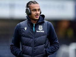 Stoke City Transfer Notebook: Spurs’ Stance on Ashley Phillips & Ongoing Centre-Half Search     With the summer transfer window looming, Stoke City’s recruitment team is working tirelessly behind the scenes to strengthen key areas of the squad. At the top of the priority list: bolstering the heart of defence. While the club has several targets under consideration, the situation surrounding Tottenham Hotspur defender Ashley Phillips remains a focal point — and one of growing complexity….